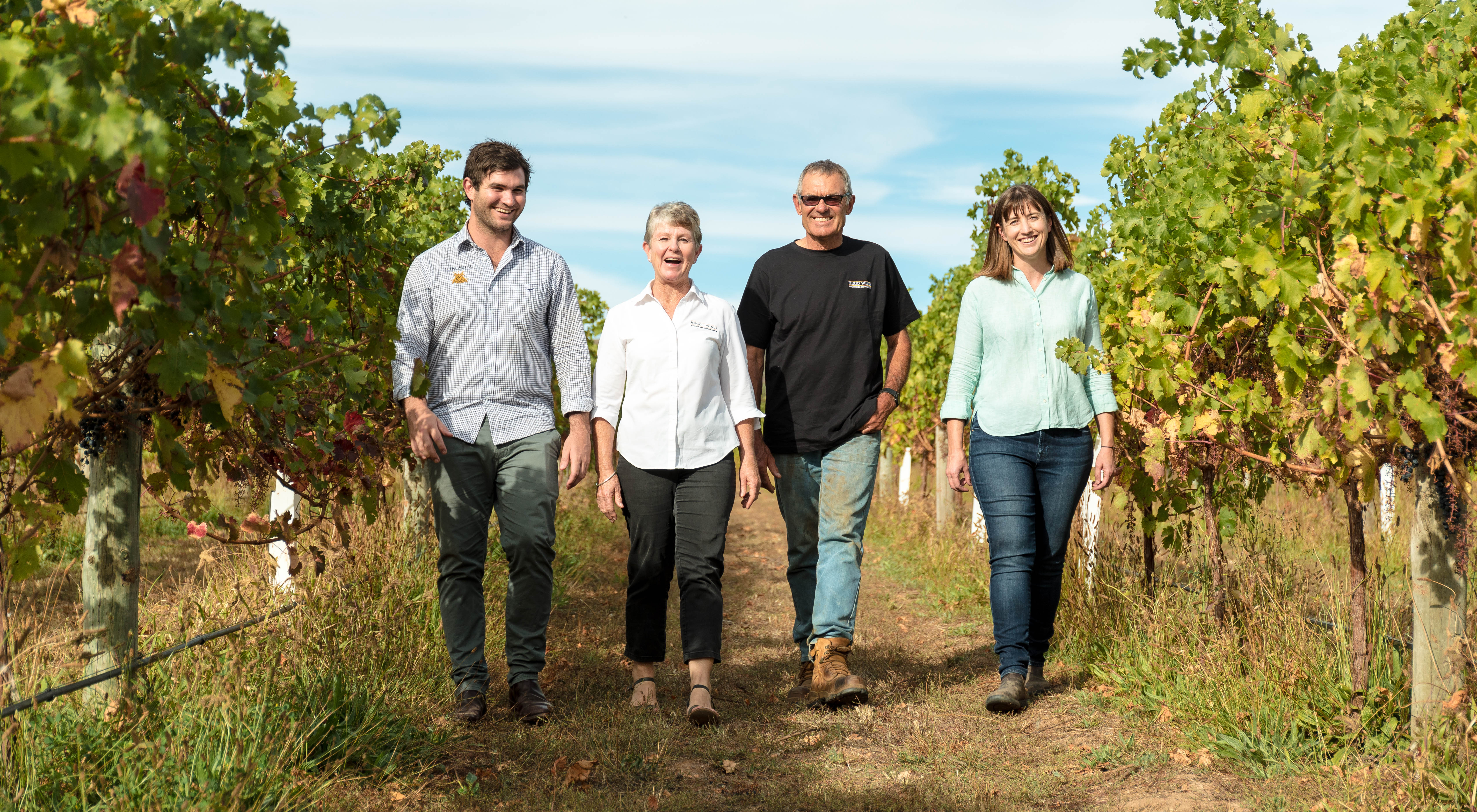 People walking in vineyard